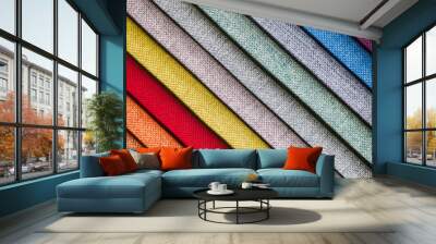 Colorful and bright fabric samples of furniture and clothing upholstery. Close-up of a palette of textile abstract diagonal stripes of different colors Wall mural