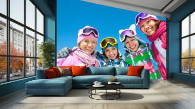 Company of friends on ski holiday Wall mural