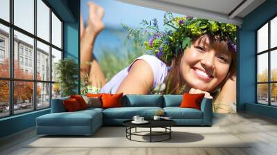 Pretty girl on field Wall mural