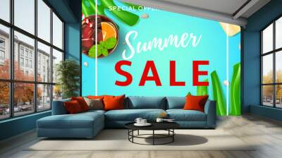 Summer sale backdrop with web button. Top view on sunglasses, seashells, fresh cocktail and ice cream on blue background. Vector illustration with leaves of tropical plant. Wall mural