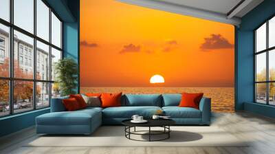 Fabulous sunset on a background of sky and sea. Wall mural