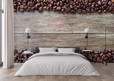 Coffee beans on a wooden background. The top view. flat lay. Copy space for an inscription. Wall mural