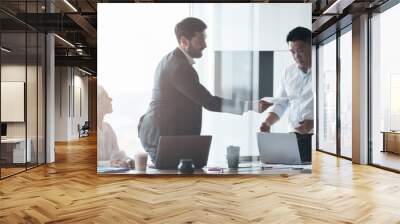 Creative business people working on project in modern office with panoramic view. Blurred background Wall mural