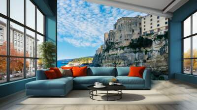 beautiful paniramic town of Tropea in Italy with scenic blue sea coast and old historic houses on a high rock mountain abobe coast, travel europe landscape Wall mural