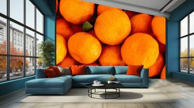 orange mandarin background of fresh juicy tangerines close up, vegan friut conception of citrus Wall mural