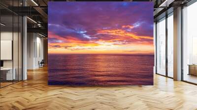 view at sunrise or sunset in sea with nice beach , surf , calm water and beautiful clouds on a background of a sea landscape Wall mural