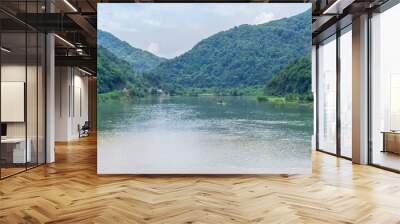 view of the confluence of two rivers, mountains Wall mural