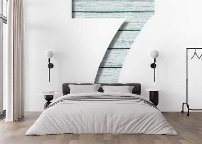 Font on old boards. The digit seven, 7 cut out of paper on a rustic wall of old boards with blue paint. Set of decorative fonts. Wall mural