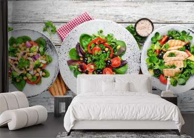 A set of delicious restaurant dishes on a white wooden background Top view. Free space for your text. Flat lay Wall mural