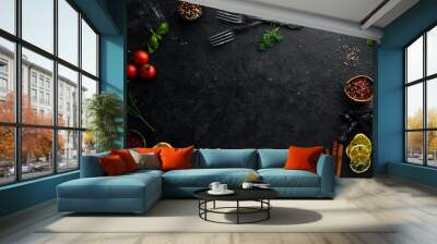 Black Stone Food Background. Cooking Ingredients. Top view. Free space for your text. Wall mural