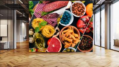 Collage. Background of vegetables, fruits and spices. Top view. On a wooden background. Wall mural