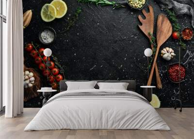 Cooking background. Fresh spices, rosemary and vegetables. Top view. Free space for text. Wall mural