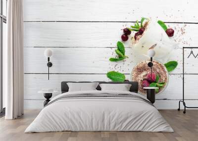 Dessert Tiramisu with cherries. Top view. Free space for your text. Wall mural