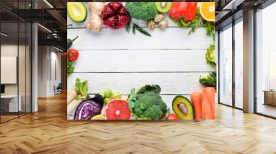 Fresh vegetables and fruits on a white wooden background. Healthy Organic Food. Top view. Free copy space. Wall mural