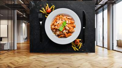 Pasta Pene with Bacon and Cherry Tomatoes. Italian dish Free space for your text. Top view. Wall mural