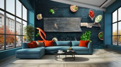 Preparing for cooking. Spices, vegetables, kitchen board. Top view. Free space for your text. Rustic style. Wall mural