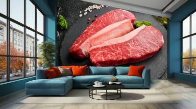 Raw fresh marble meat Black Angus Steak Ribeye on a dark background. Top view. Raw meat. Wall mural