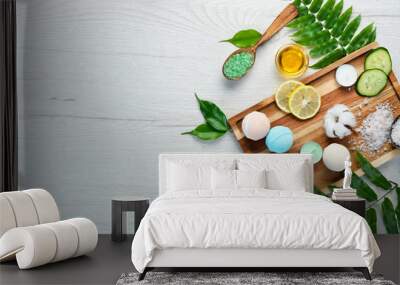 Sea salt bath bombs and spa treatments on a white table. Top view. Free space for your text. Wall mural