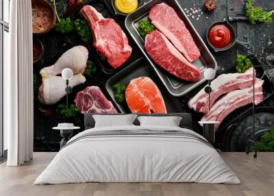 Set of fresh raw meat and fish in plastic boxes: veal, salmon steak, chicken, pork. Banner for the supermarket. On a dark background. Organic food. Wall mural