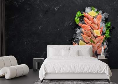 Shrimp with ice and lemon. On the old background. Top view. Free copy space. Wall mural