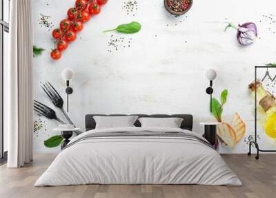 White wooden food background. Vegetables and spices on white old table. Wall mural