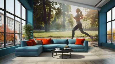 woman running in the park Wall mural