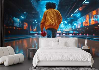 Black person enjoying evening by bowling down lane while wearing casual attire holding shining red ball aimed toward pins, Generative AI Wall mural