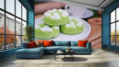 Kue Putu Ayu, a traditional Indonesian snack made from rice flour, pandan leaves, grated coconut then steamed. Wall mural