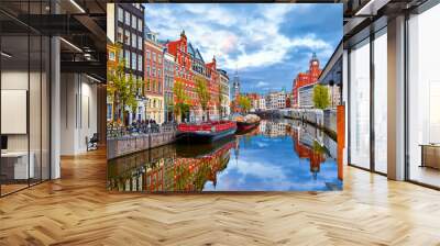 Channel in Amsterdam Netherlands houses river Amstel landmark old european city spring landscape. Wall mural