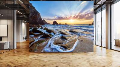 Sand beach among rocks on evening sunset. Ursa near Cape Roca Wall mural