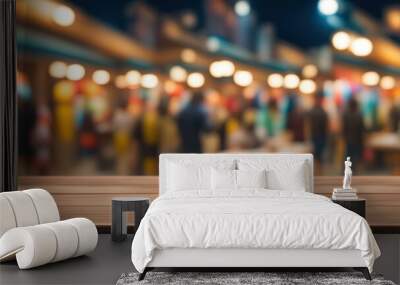 Empty wooden table top with blurred background of a Japanese winter market people walking around and eating at food stalls under lights at night Wall mural