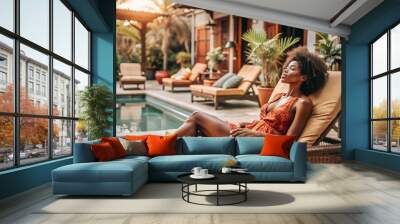 Black female solo traveller relaxing on summer vacation at a quiet luxury villa Wall mural