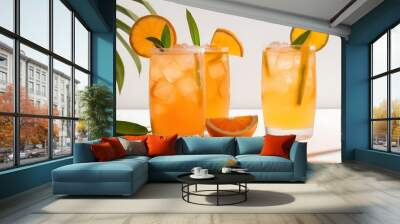 summer orange cocktails with citrus fruits on white background. hard seltzer, lemonade, refreshing d Wall mural