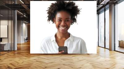 Portrait of a smiling casual woman holding smartphone over transparent background Wall mural