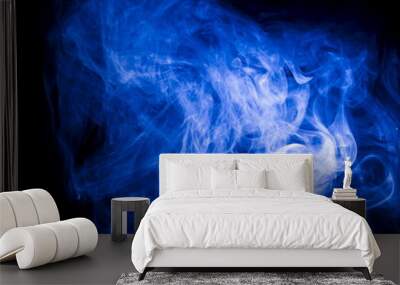 Blue smoke on black background Wall mural