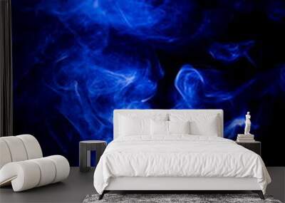 Blue smoke on black background Wall mural