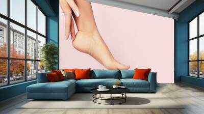 Beautiful well-groomed female legs . Foot care . Wall mural