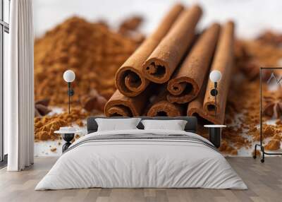 Fragrant canella sticks and canella powder. Isolated, no background. Wall mural