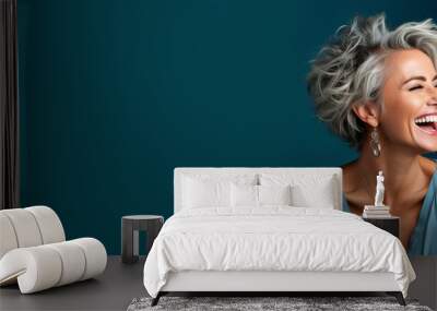 Portrait of a beautiful smiling elderly woman with gray hair Wall mural