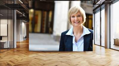 Businesswoman posing at outdoors Wall mural