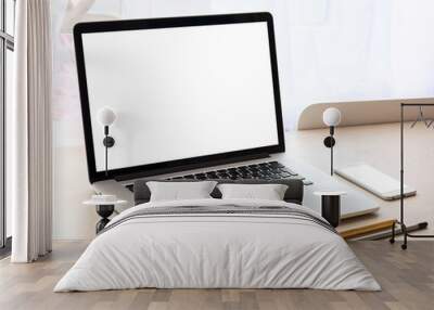 Modern laptop on a table with blank screen Wall mural