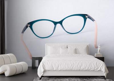 glasses for vision on a light background in the studio Wall mural