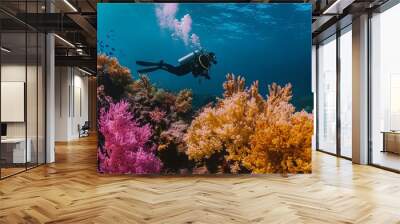 Scuba diver exploring vibrant coral reefs underwater, marine life Wall mural