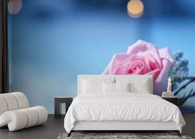 Pink rose and a blue gift box with white bow. Happy Valentine's Day greeting card concept. AI generated image Wall mural