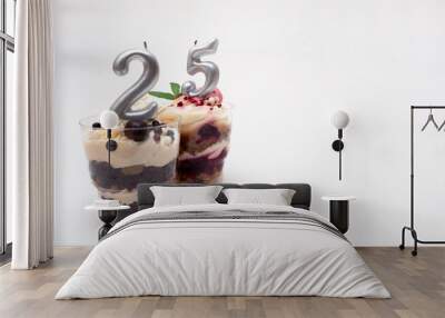 Birthday trifle cake with candle labeled number 25 on white background Wall mural