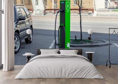 Power supply for electric car charging. Electric car charging station Wall mural