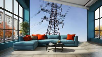 High-voltage power lines at sunset or sunrise. High voltage electric transmission tower Wall mural