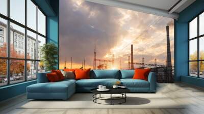 Thermal power stations and power lines during sunset. Wall mural