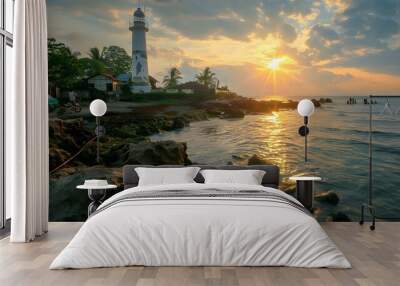 Tropical coast with a lighthouse on a rocky Wall mural