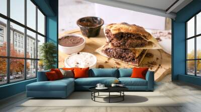 Hot brownie filled in naan bread sandwich perfect fusion dessert food with dips Wall mural